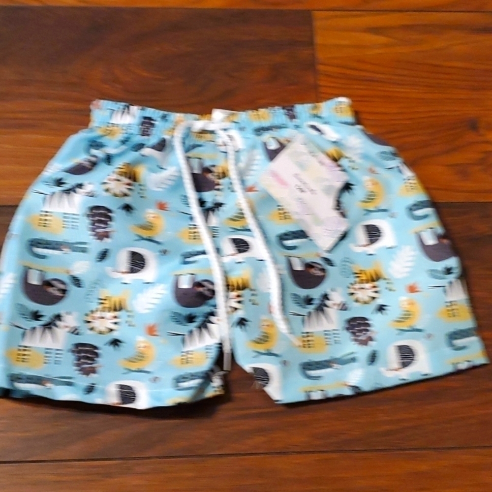 New lined baby boy swim trunks size 12m